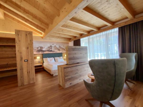 DOLOMITES B&B - Suites, Apartments and SPA Tesero